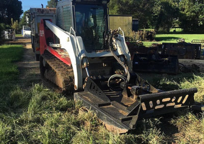 Heavy earthmoving machinery on a Byron Bay site